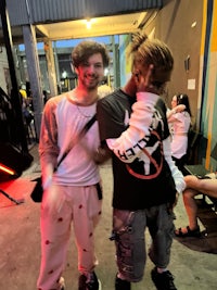 two men standing next to each other